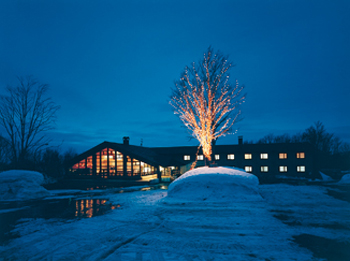 Hotel facade at night.